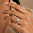 Model wearing Heritage Round Milgrain Halo lab-grown diamond ring in 18K white gold