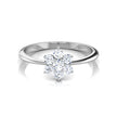 White Gold Engagement Diamond Ring with a diamond flower setting on a white background
