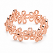 A rose Platted metal stretch women silver ring featuring a continuous pattern of openwork flower motifs, shown on a clean white background