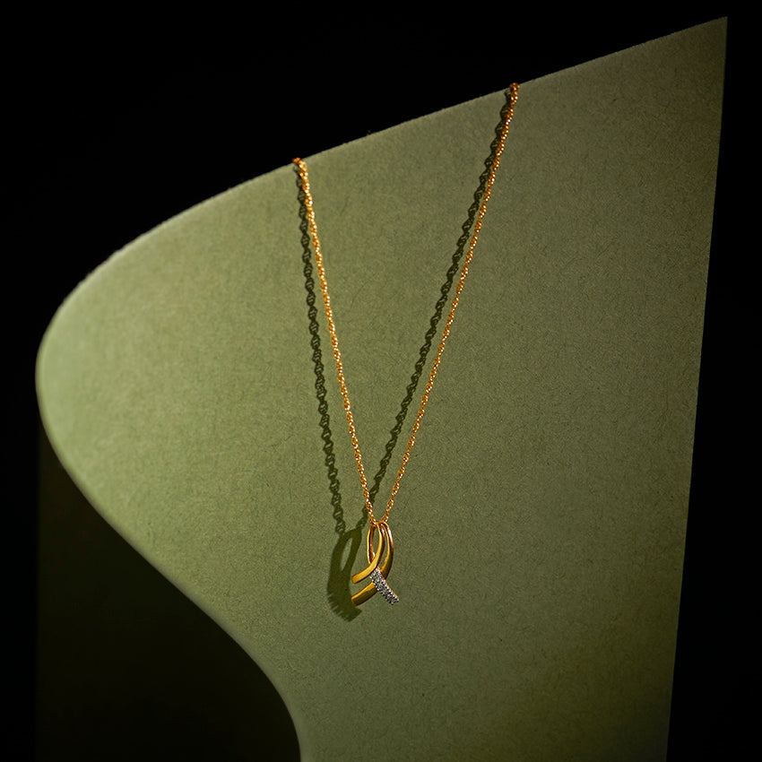 Ribbon Gold Diamond Pendant