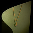 Ribbon Gold Diamond Pendant