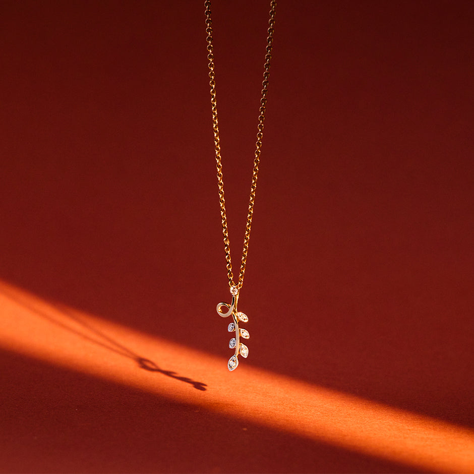 Dropping Leaf Gold Diamond Pendant