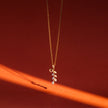 Dropping Leaf Gold Diamond Pendant
