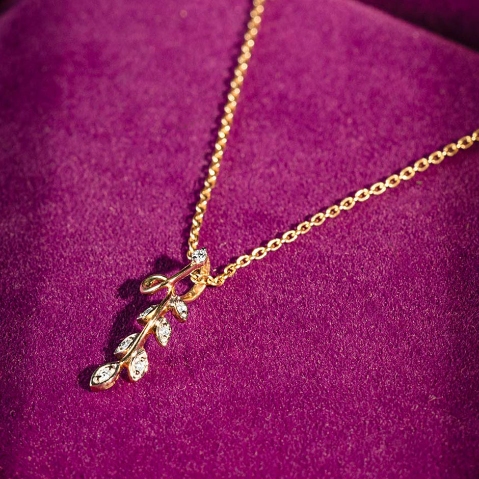 Dropping Leaf Gold Diamond Pendant