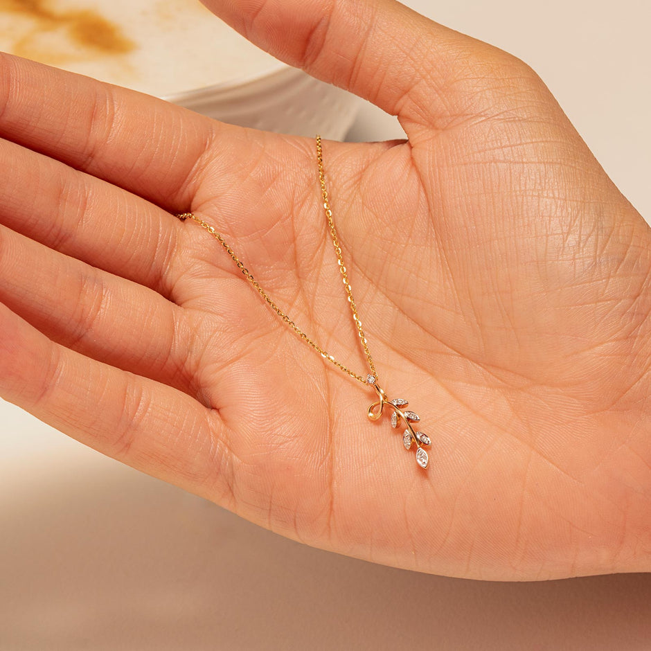 Dropping Leaf Gold Diamond Pendant