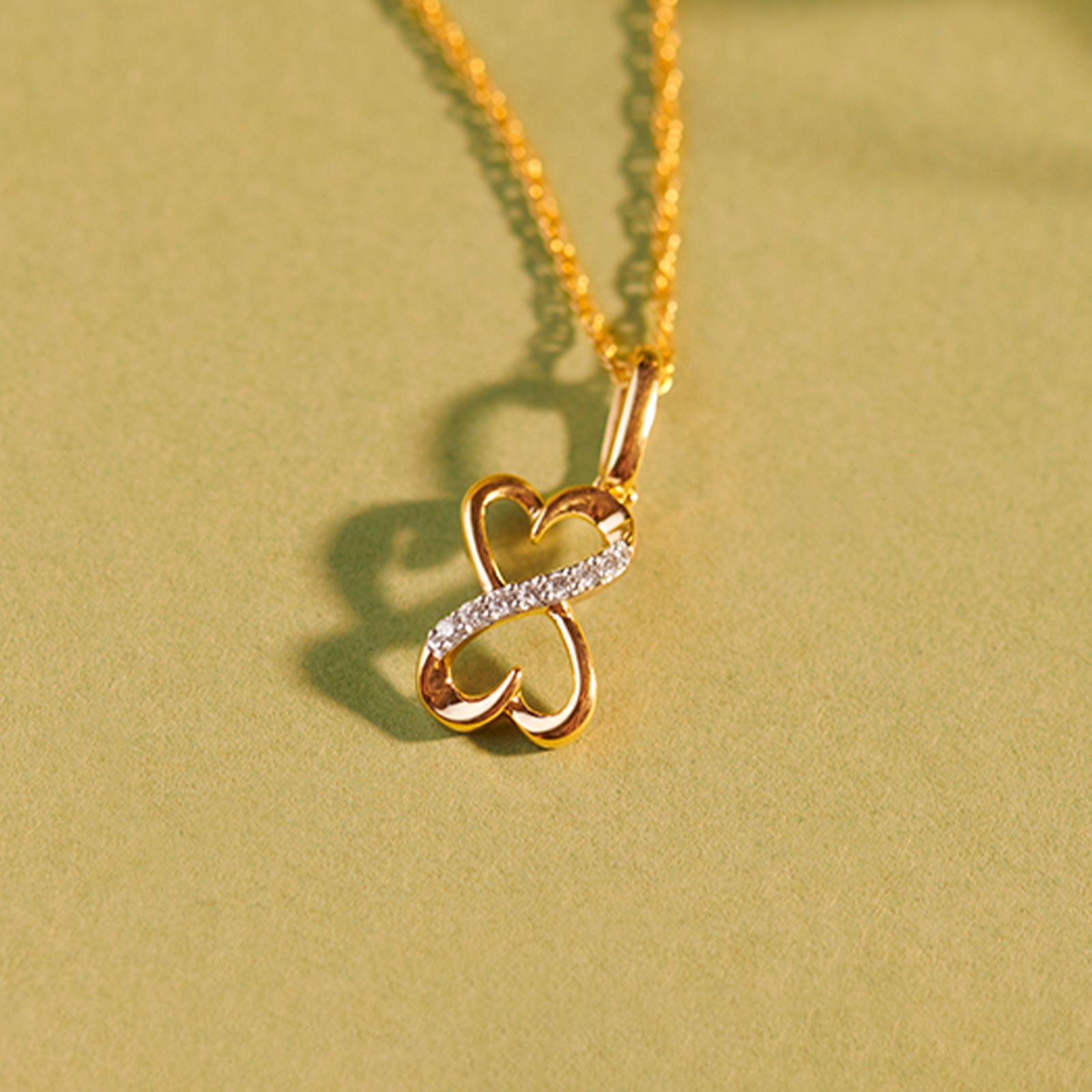 Intertwined Heart & Infinity Gold Diamond Pendant