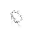 A silver ring designed with a continuous leafy vine pattern, shown on a clean white background with a soft reflection underneath.