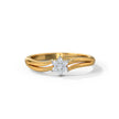 Gold ring with a diamond on a white background