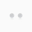 A pair of white  stud earrings with intricate, multi-layered snowflake or starburst designs set with clear diamonds, displayed on a clean white background with a soft reflection below.