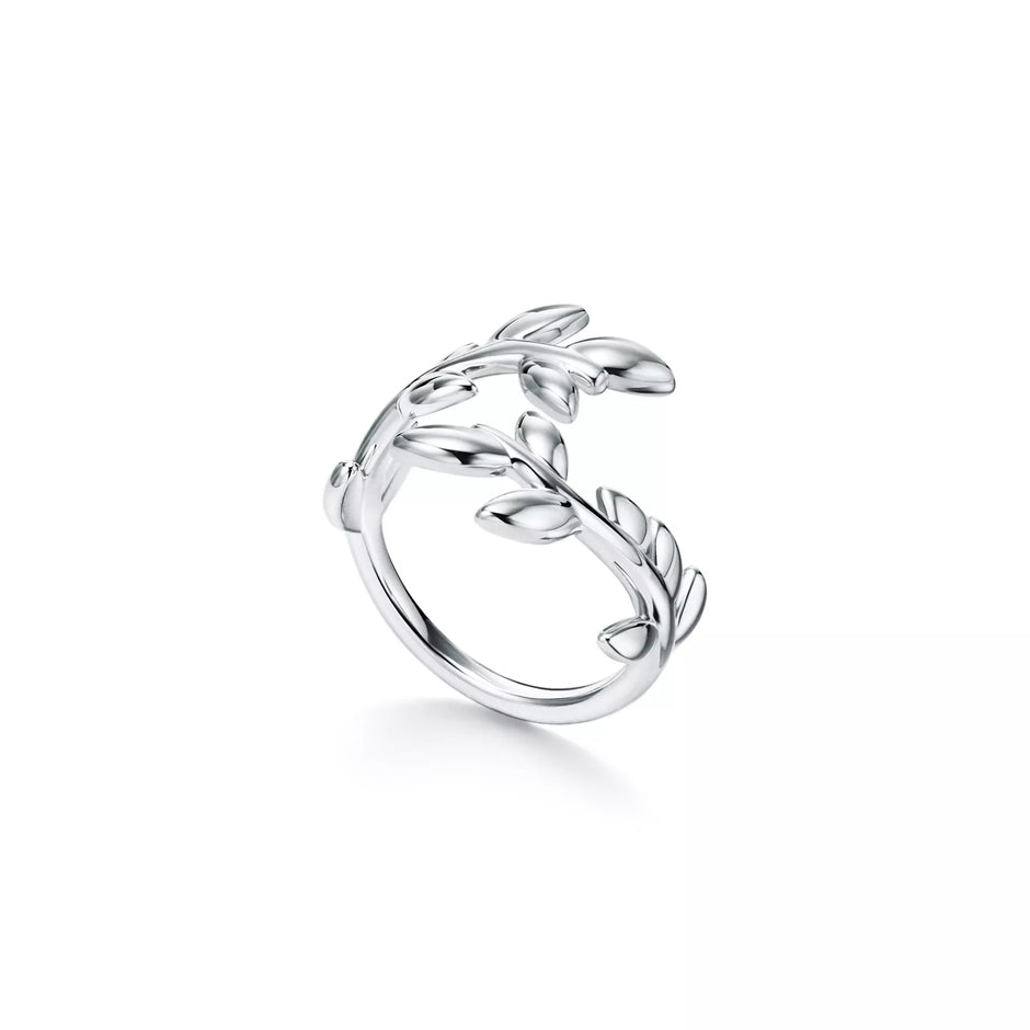 Women Silver ring with leaf design on a white background