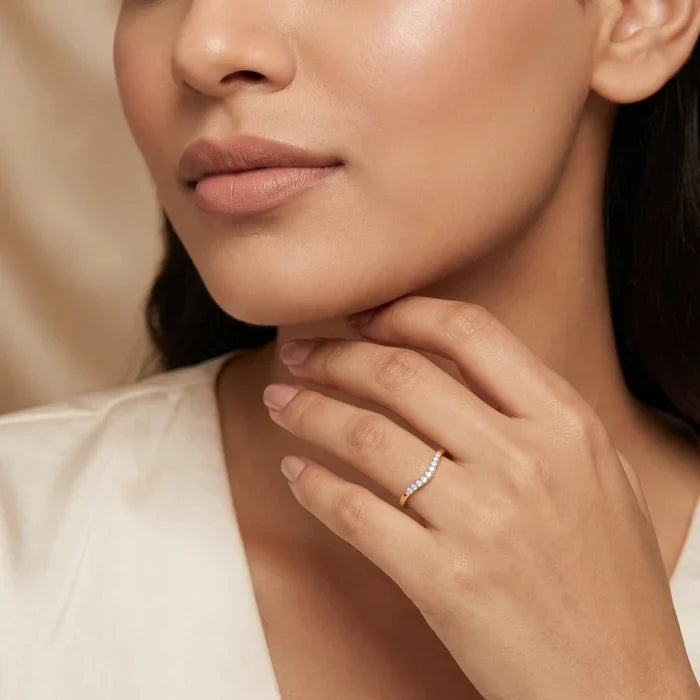 Curved Pavé Gold Diamond Band yellow gold ring worn by a woman – gold diamond ring for women in Pakistan
