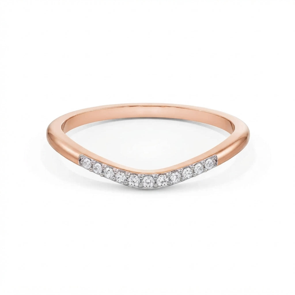 Curved pavé gold diamond band in rose gold