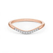 Curved pavé gold diamond band in rose gold