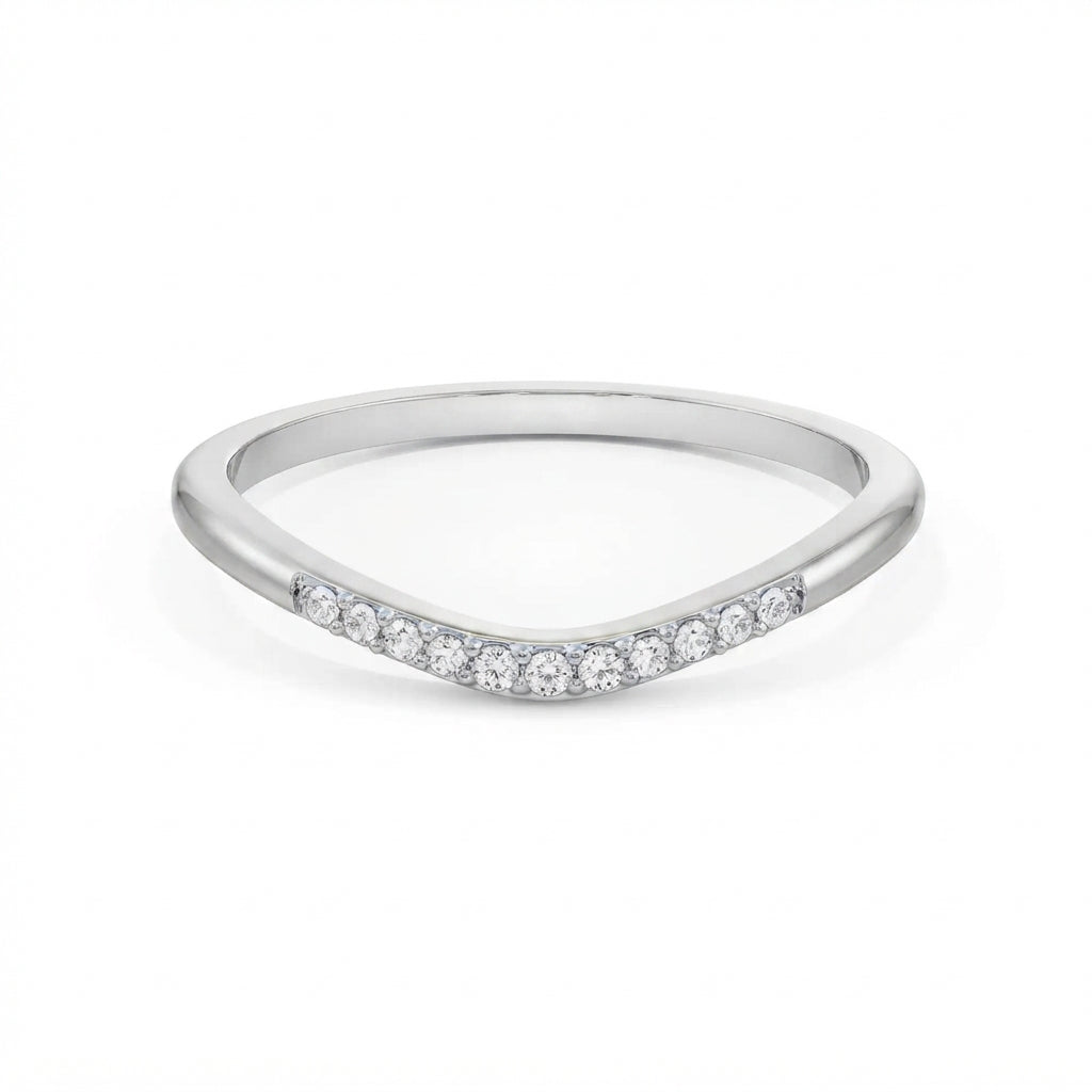 Curved pavé gold diamond band in white gold