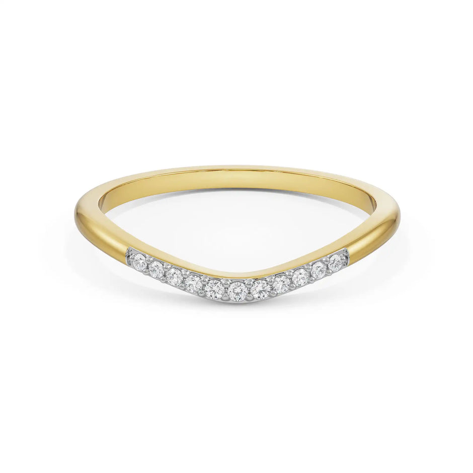Curved pavé gold diamond band in yellow gold