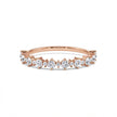 Graduated round diamond gold ring in rose gold