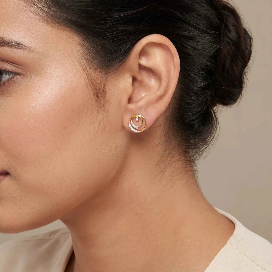 Orbit Swirl Gold Diamond Stud Earrings