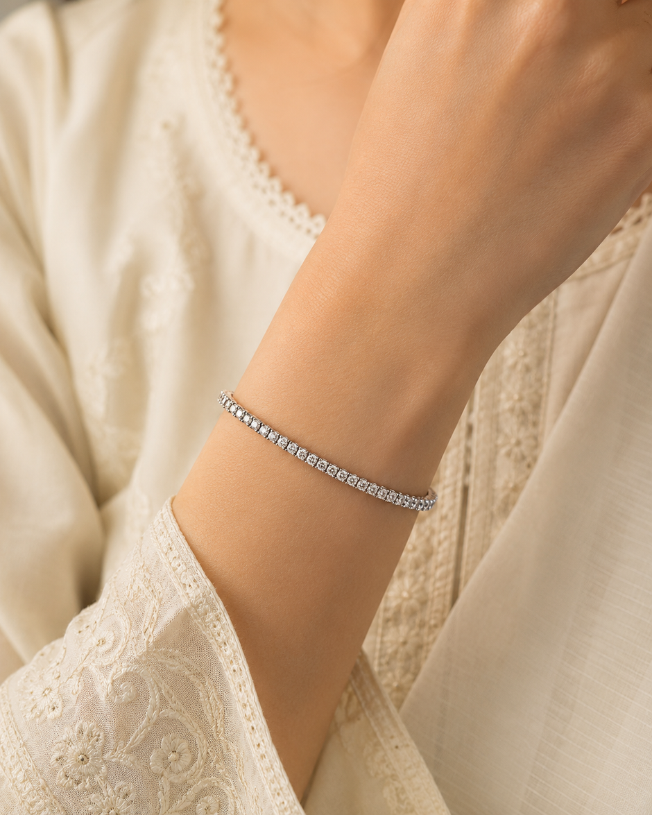 Meher Tennis Line Women Silver Bracelet worn on a woman's wrist, white 925 sterling silver lifestyle view
