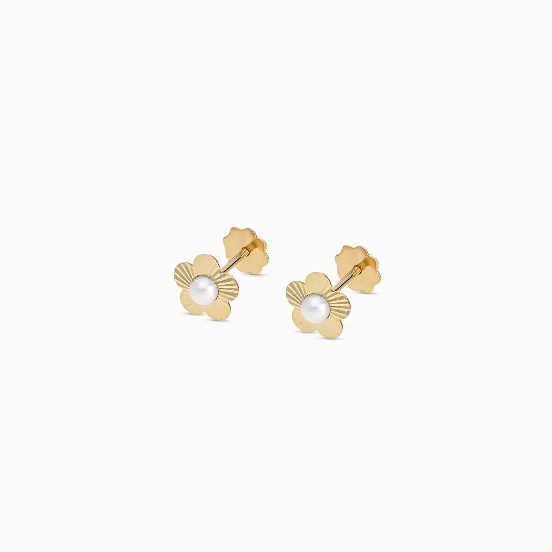A pair of gold flower stud earrings with a white pearl center, shown on a clean white background.