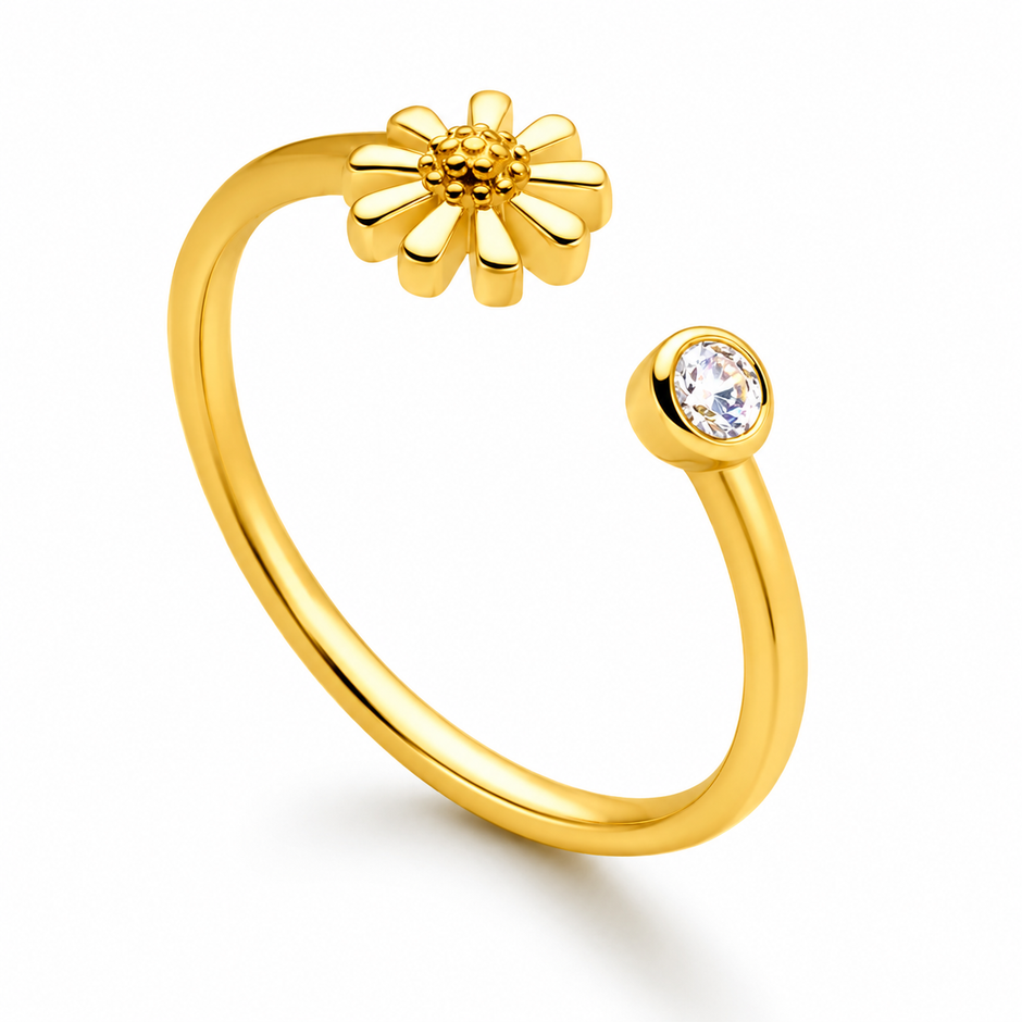 A gold platted Women Silver  open ring ring featuring a small daisy flower on one end and a round clear gemstone on the other, shown on a white background.