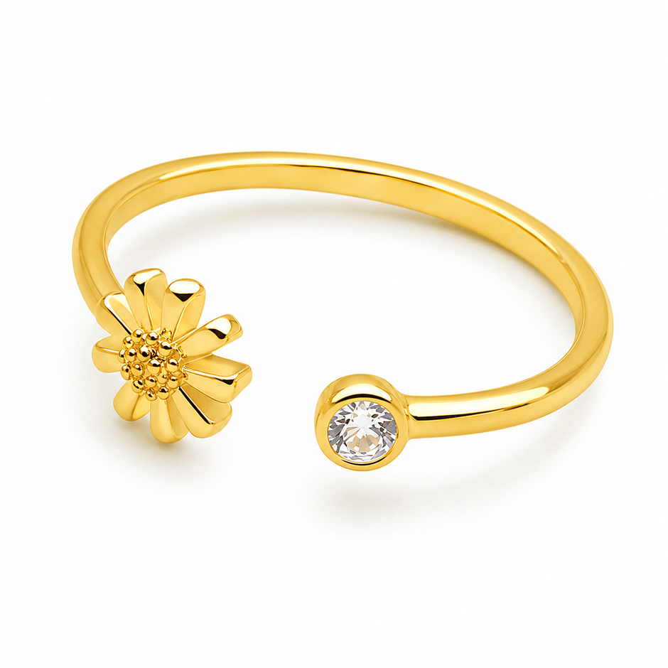 A gold Platted women silver ring open-ended ring featuring a small flower charm on one end and a bezel-set clear round stone on the other, shown on a plain white background.